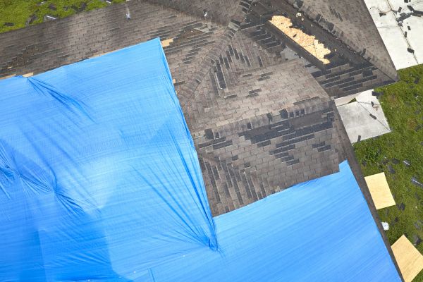 Storm Damage Roof Tarping in West Springfield